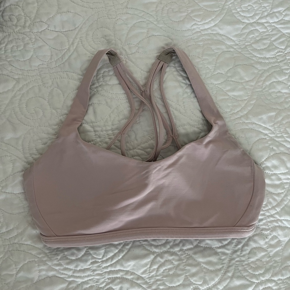 Soft pink Lululemon sports bra